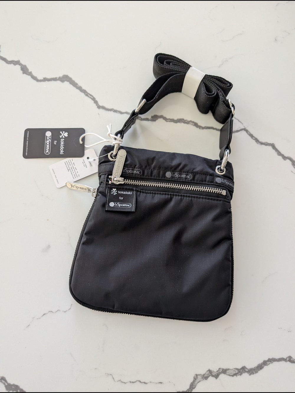 LeSportsac x tokidoki Black Tracolla Crossbody Bag with fun interior pattern